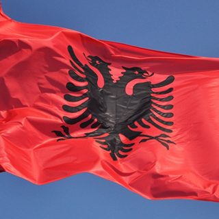 албания