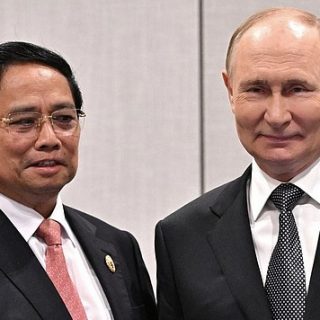 Владимир Путин и Фам Минь Тинь