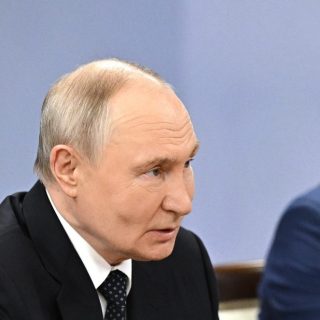 Путин