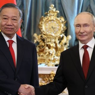Путин и То Лам