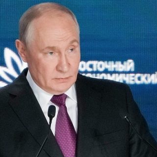 Путин